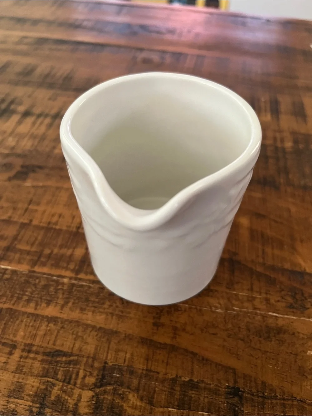 Classic White Ceramic Creamer with Embossed Detail